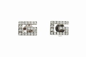 GUCCI - Peso gr 1 6 Coppia di orecchini in oro bianco  firmati Gucci  recanti la lettera G in diamanti taglio brillante  [..]