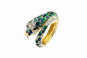 ANELLO - Peso gr10 4 Misura 17 (57) in oro giallo  a forma di serpente  con smalto blu e verde; testa impreziosita da diamanti  [..]