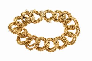 BRACCIALE - Peso gr 76 0 in oro giallo lavorato ad anelli a corda intrecciati