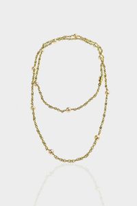 LUNGA COLLANA - Peso gr 34 3 Lunghezza cm 100 in oro giallo a maglia a corda con perle giapponesi del diam di mm 7