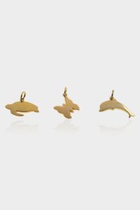 POMELLATO - Peso gr 8 5 Lotto di tre ciondoli in oro giallo  firmati Pomellato  modello Dodo  raffiguranti un delfino  una  [..]