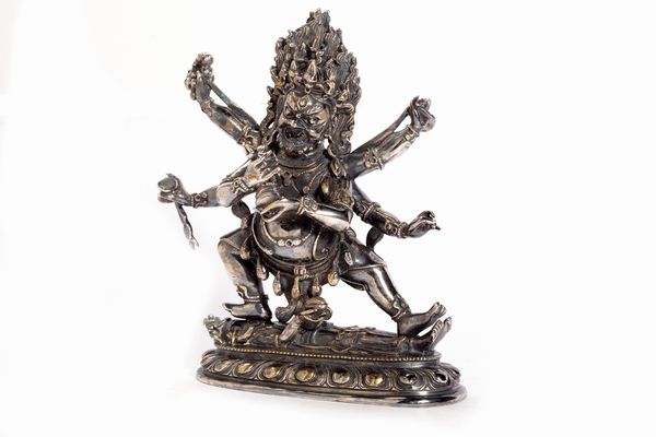 Mahakala in argento, Tibet prima met del secolo XX  - Asta Arte Orientale - Associazione Nazionale - Case d'Asta italiane