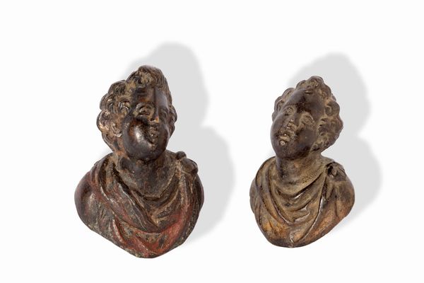 Due bustini in bronzo, probabilmente maniglie di mobile, secolo XVII  - Asta Incanti d'Arte - Associazione Nazionale - Case d'Asta italiane