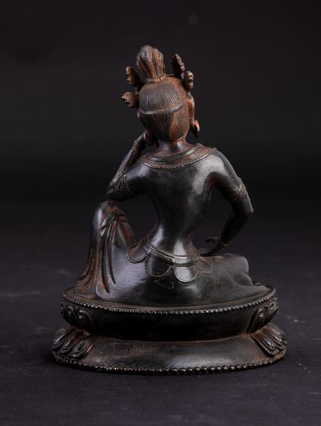 Figura in bronzo raffigurante Tara seduta su doppio fiore di loto, Tibet, XIX secolo  - Asta Arte Orientale | Cambi Time - Associazione Nazionale - Case d'Asta italiane