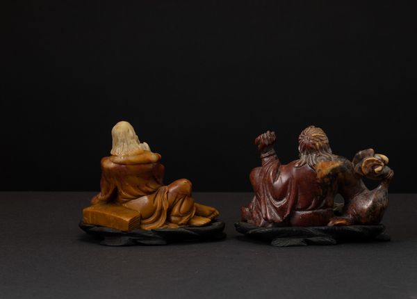 Due figure di Budai scolpite in saponaria, Cina, XX secolo  - Asta Arte Orientale | Cambi Time - Associazione Nazionale - Case d'Asta italiane