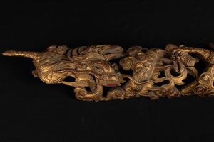 Fregio a foggia di drago scolpito in legno dorato, Indonesia, XIX secolo  - Asta Arte Orientale | Cambi Time - Associazione Nazionale - Case d'Asta italiane