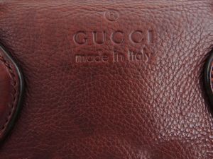 Borsa a mano in pelle marrone, Gucci  - Asta Fashion Vintage e Bijoux / Un guardaroba maschile - Associazione Nazionale - Case d'Asta italiane