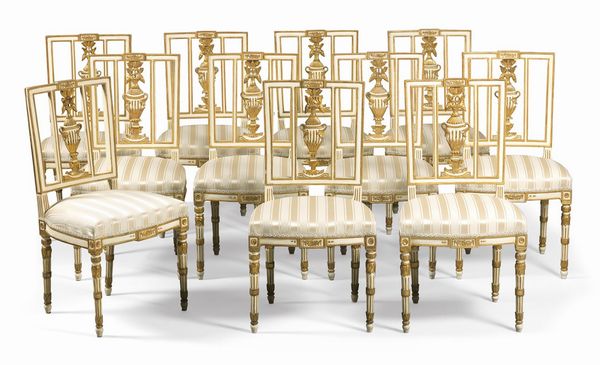 Undici sedie e un divano a tre posti in legno intagliato, laccato avorio e dorato  - Asta Importanti Arredi e Dipinti Antichi - Associazione Nazionale - Case d'Asta italiane