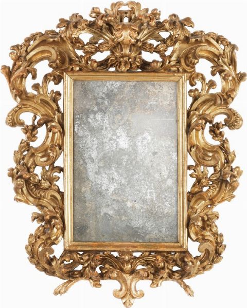 Specchiera in legno riccamente intagliato e dorato  - Asta Importanti Arredi e Dipinti Antichi - Associazione Nazionale - Case d'Asta italiane