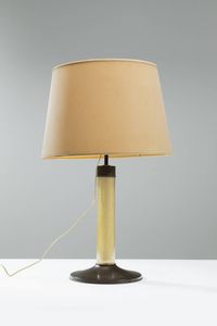 TOMMASO BARBI - Lampada da tavolo in vetro con inclusione di foglia d'oro  base e particolari in metallo brunito. Anni '60 Etichetta  [..]