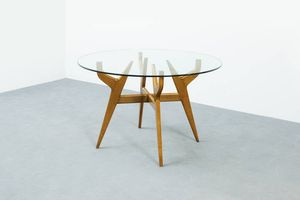 PRODUZIONE ITALIANA - Tavolo con struttura in legno di noce  piano in vetro molato di forte spessore. Anni '50 cm 75x120