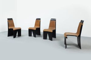 PRODUZIONE ITALIANA - Quattro sedie in legno laccato  seduta imbottita rivestita in cuoio. Anni '70 cm 91x45x60