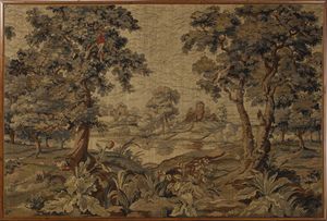 MANIFATTURA DI AUBUSSON XVIII SECOLO - Arazzo raffigurante paesaggio boschivo con specchio d'acqua e rovine sullo sfondo