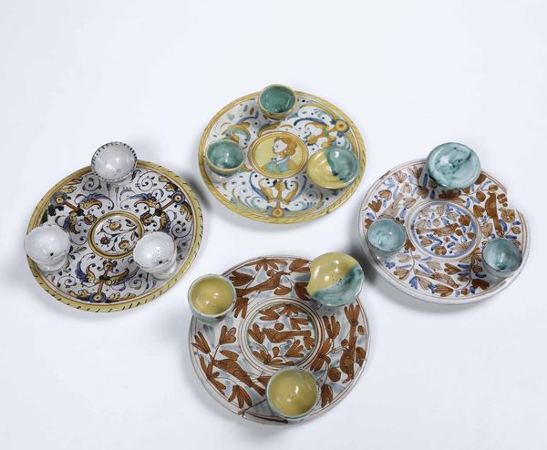 Quattro piatti portauovo<BR>Deruta, XVII secolo  - Asta Ceramiche e Vetri | Cambi Time - Associazione Nazionale - Case d'Asta italiane