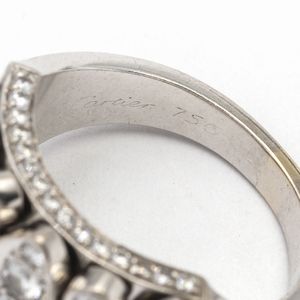Cartier, anello en tremblant in oro bianco 18kt e diamanti  - Asta Gioielli Orologi Fashion Vintage - Associazione Nazionale - Case d'Asta italiane
