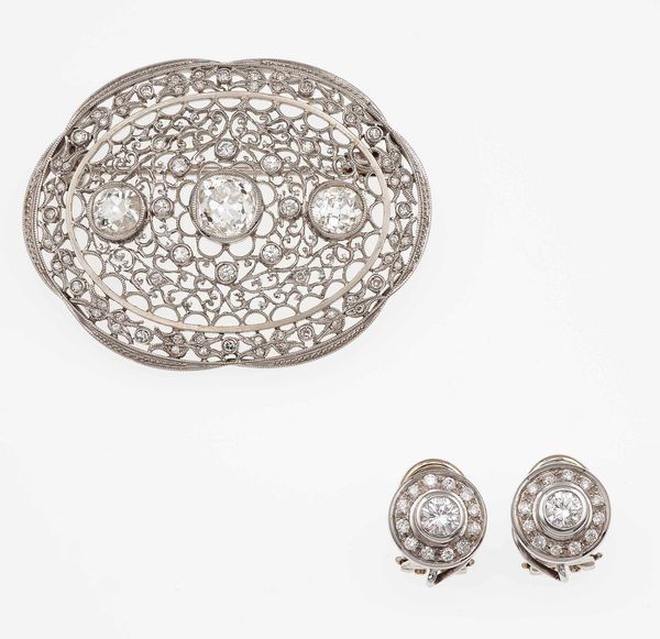 Demi-parure composta da spilla ed orecchini con diamanti  - Asta Fine Jewels - Associazione Nazionale - Case d'Asta italiane